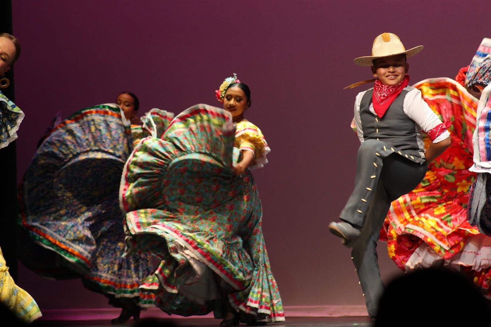 TAF dancers in motion on stage