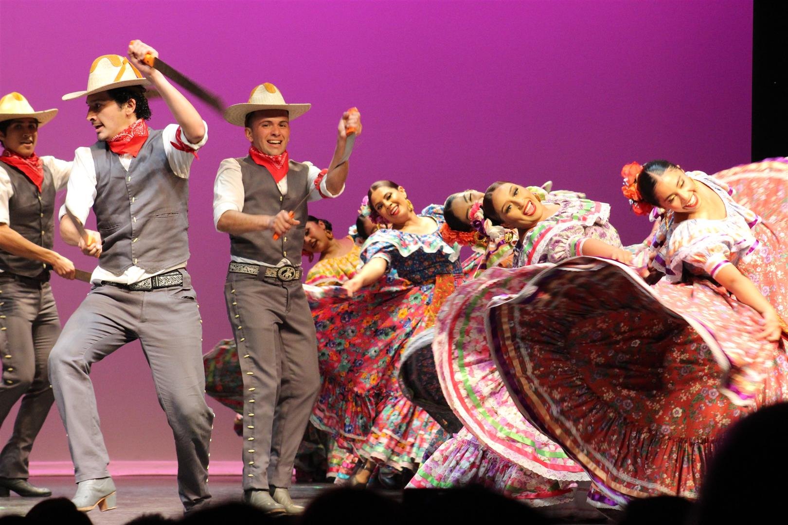 TAF dancers performing in traditional costumes